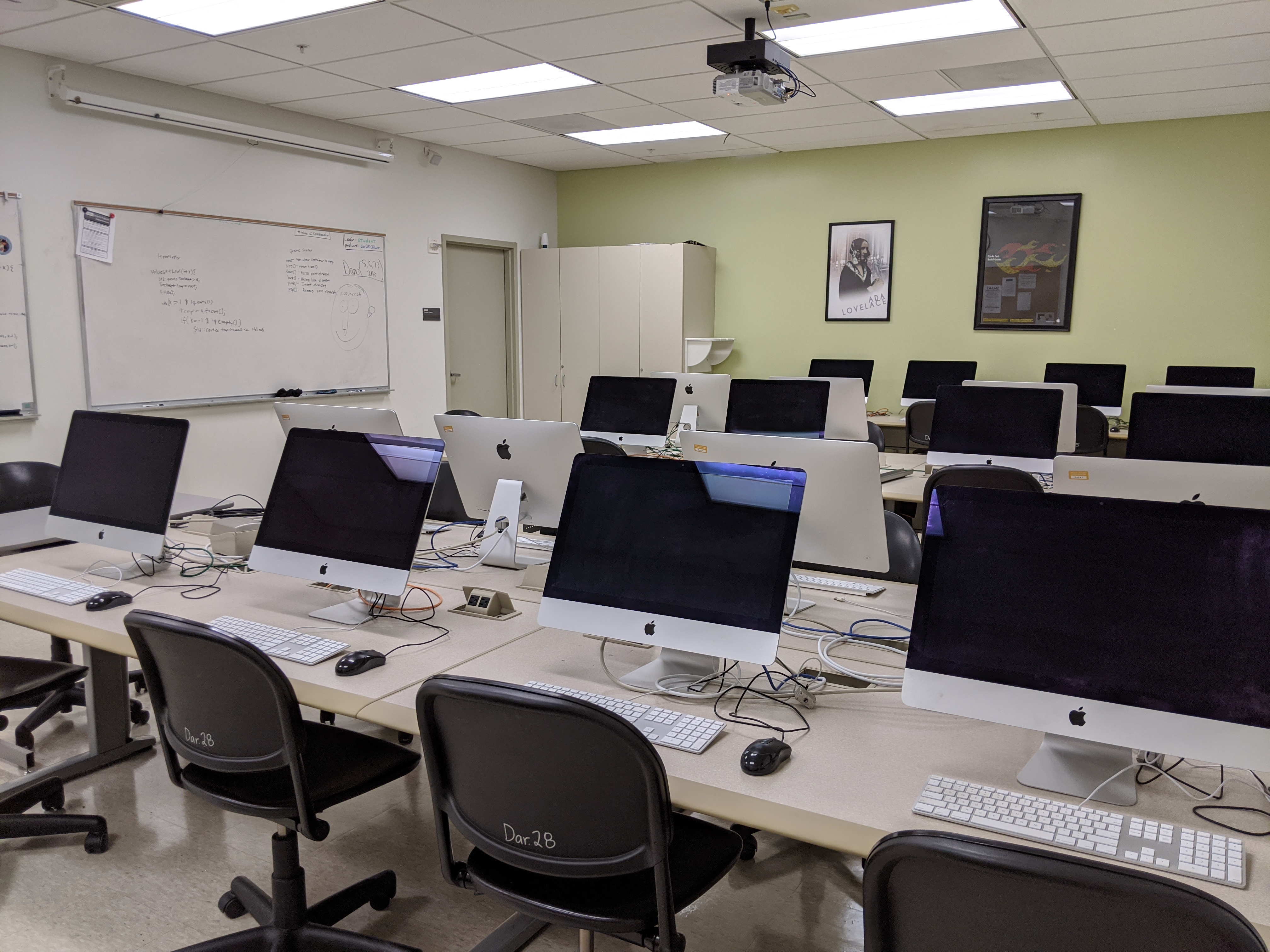 Empty computer lab with rows of computers