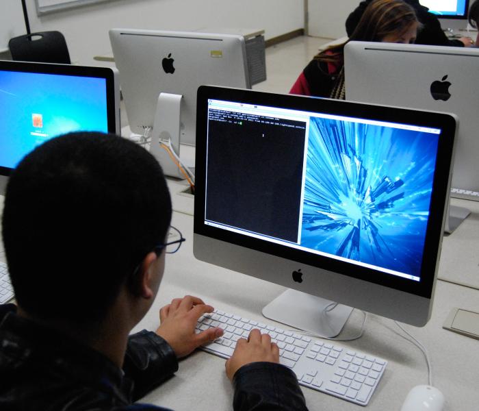 Student using a black-and-white terminal