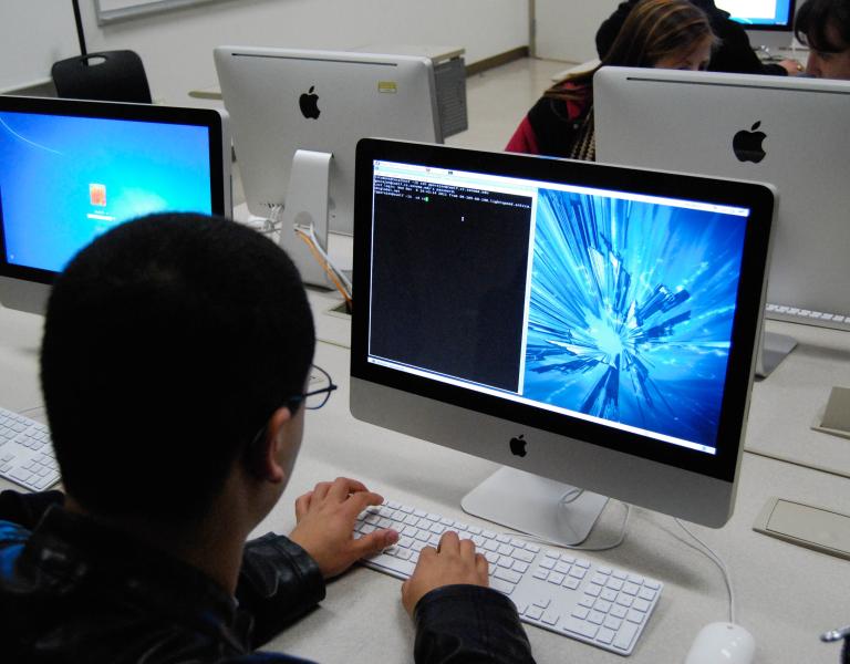 Student using a black-and-white terminal
